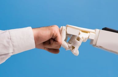 Robot and Human Fist Bump on Blue Background