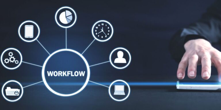 Hand on Tablet with Workflow Diagram