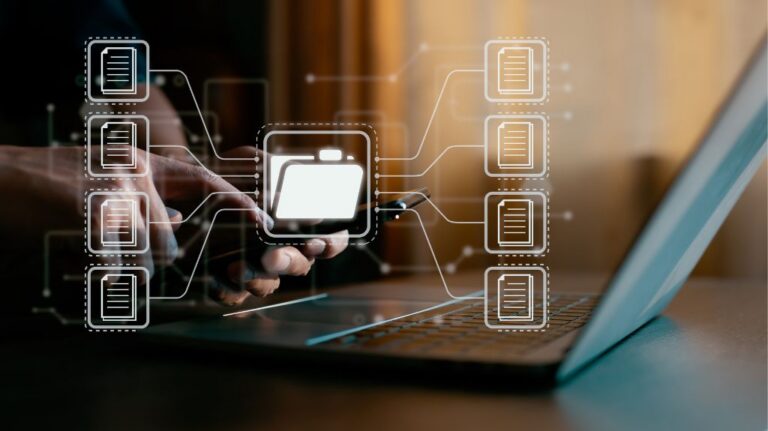 Document Management Graphics Over Man Working on Laptop