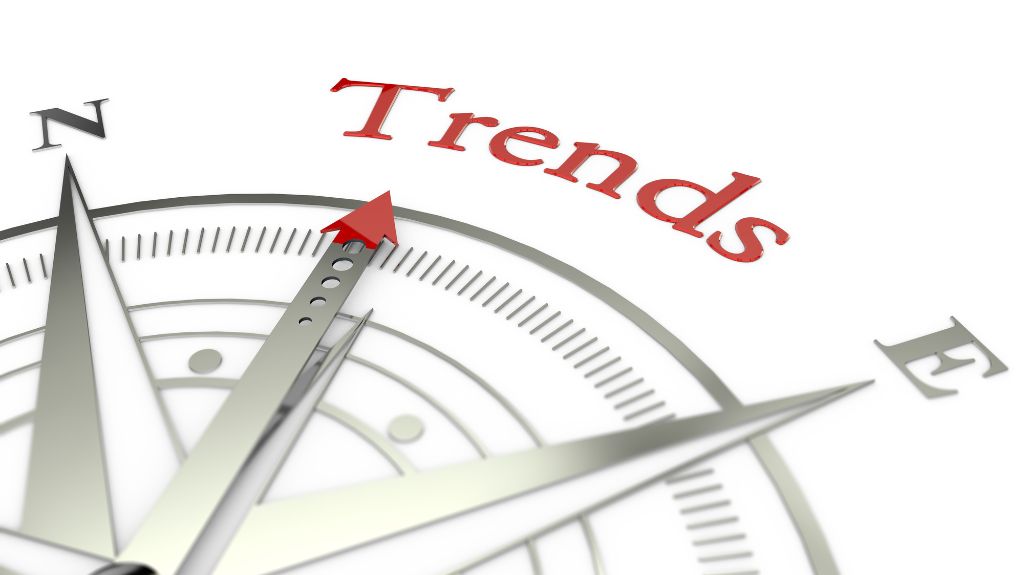Compass with Arrow Pointing to Trends Text