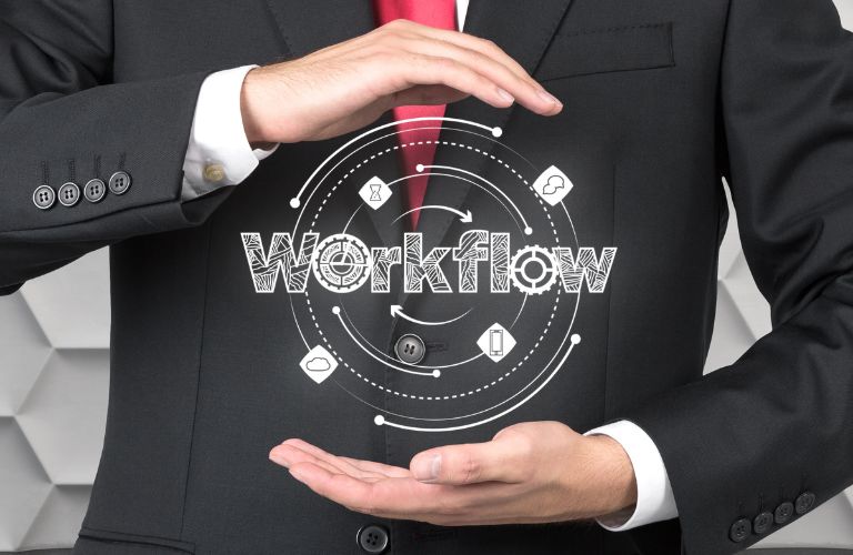 Man in Suit with Workflow Graphic