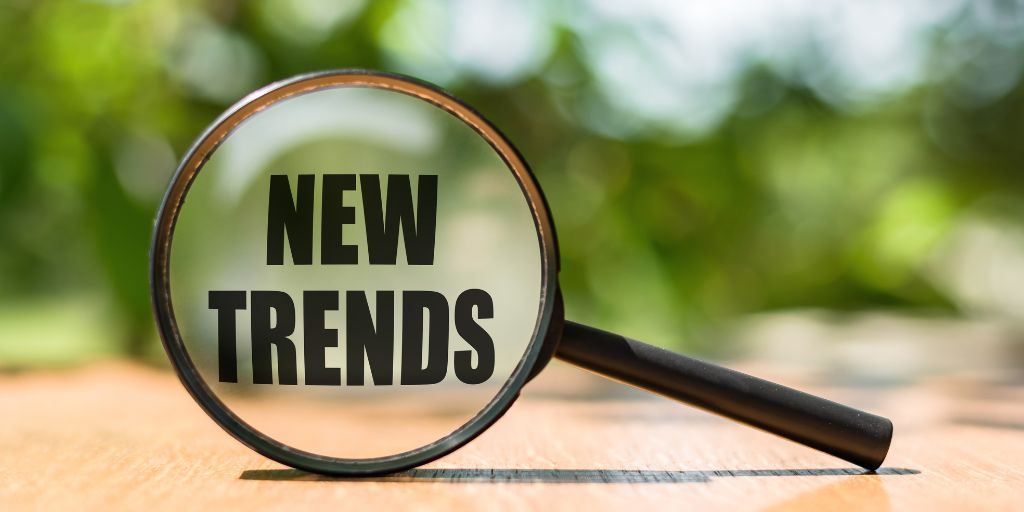 Magnifying Glass with Black New Trends Text