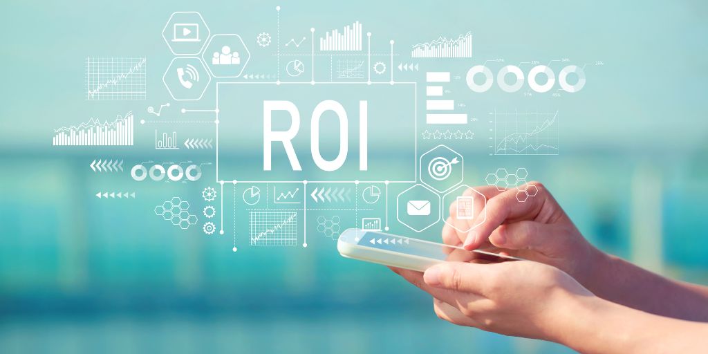 Person Holding Smartphone and ROI Graphics